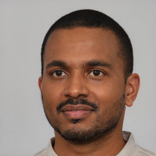 Neutral black young-adult male with short  black hair and brown eyes