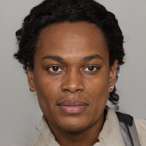 Neutral black adult female with short  black hair and brown eyes