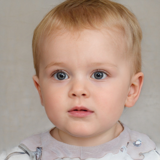 Neutral white child female with short  brown hair and blue eyes