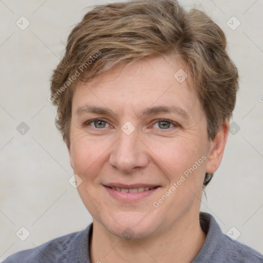 Joyful white adult male with short  brown hair and grey eyes