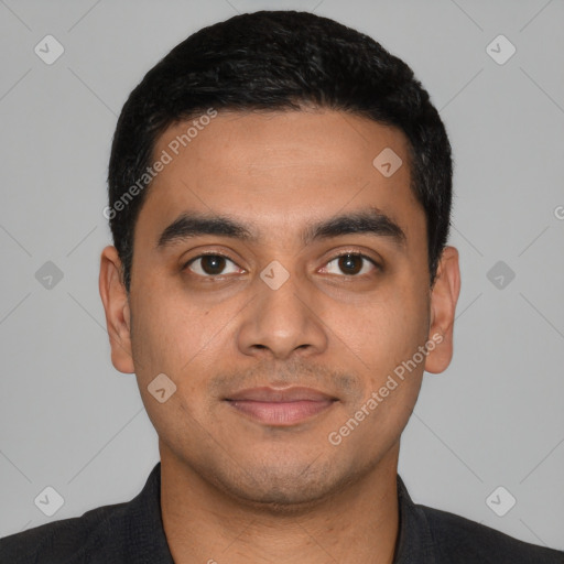 Joyful latino young-adult male with short  black hair and brown eyes