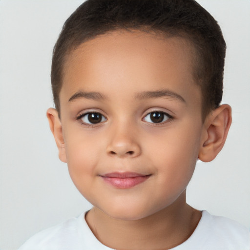 Joyful white child female with short  brown hair and brown eyes