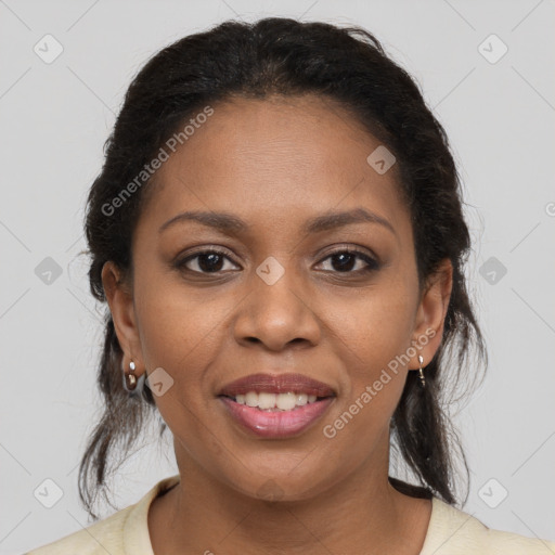 Joyful black young-adult female with medium  brown hair and brown eyes