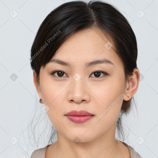 Neutral asian young-adult female with medium  brown hair and brown eyes