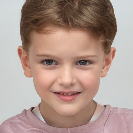 Joyful white child male with short  brown hair and brown eyes