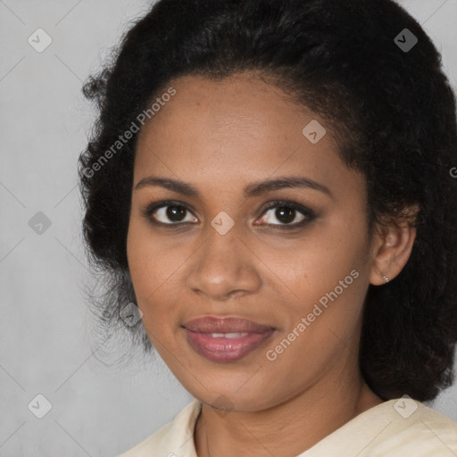 Joyful black young-adult female with medium  brown hair and brown eyes