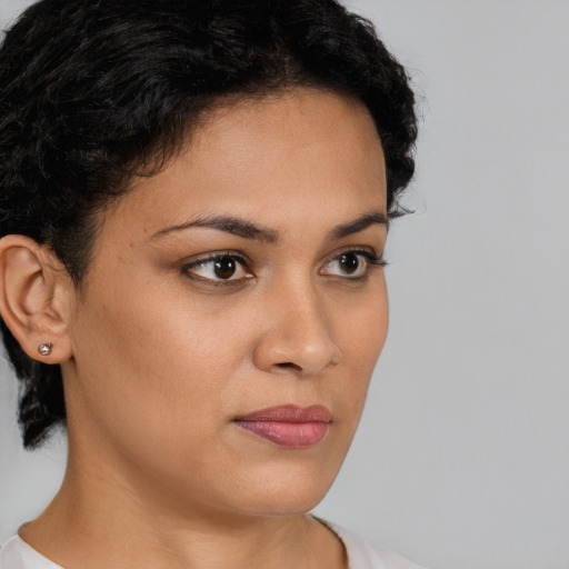 Neutral latino young-adult female with short  brown hair and brown eyes