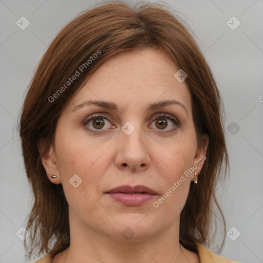 Joyful white adult female with medium  brown hair and brown eyes