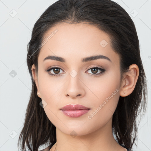 Neutral white young-adult female with long  brown hair and brown eyes