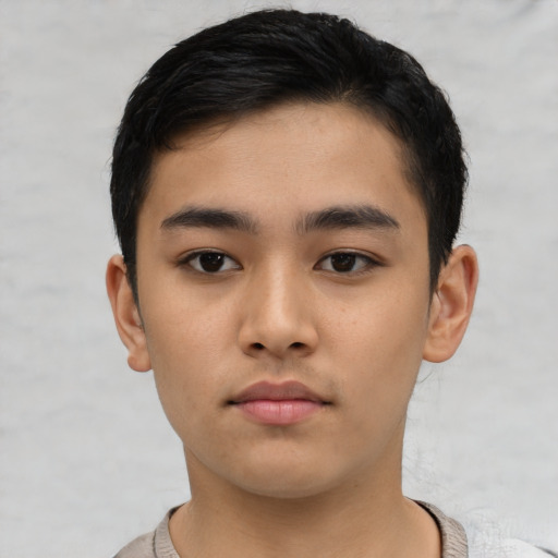 Neutral asian young-adult male with short  black hair and brown eyes
