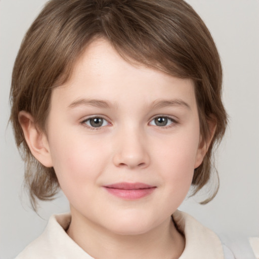 Joyful white child female with medium  brown hair and brown eyes