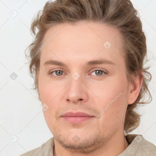 Joyful white young-adult male with medium  brown hair and brown eyes