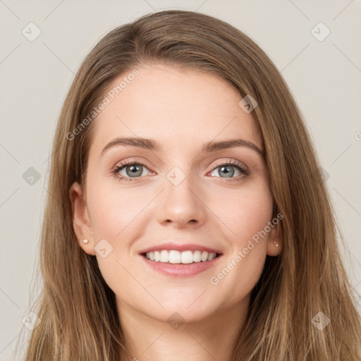 Joyful white young-adult female with long  brown hair and green eyes