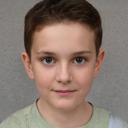 Joyful white child female with short  brown hair and brown eyes