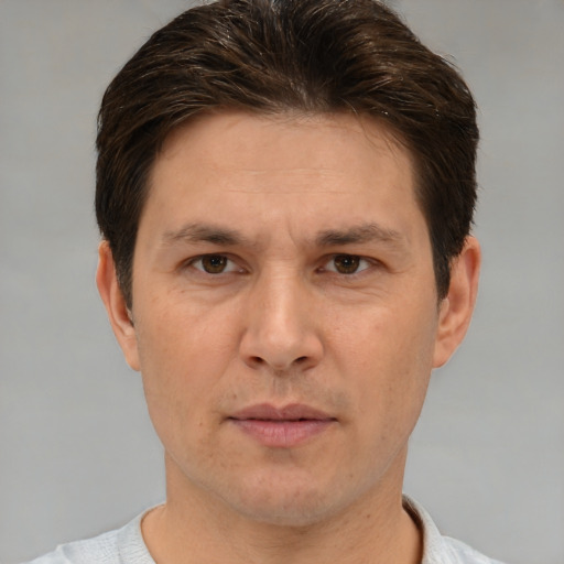 Neutral white adult male with short  brown hair and brown eyes