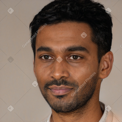 Joyful latino young-adult male with short  black hair and brown eyes