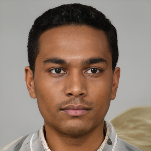 Neutral black young-adult male with short  brown hair and brown eyes