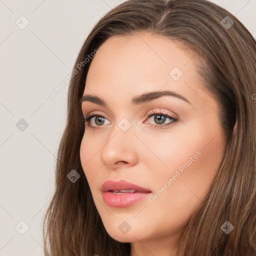 Neutral white young-adult female with long  brown hair and brown eyes