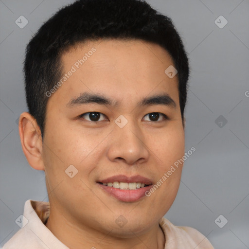 Joyful latino young-adult male with short  brown hair and brown eyes