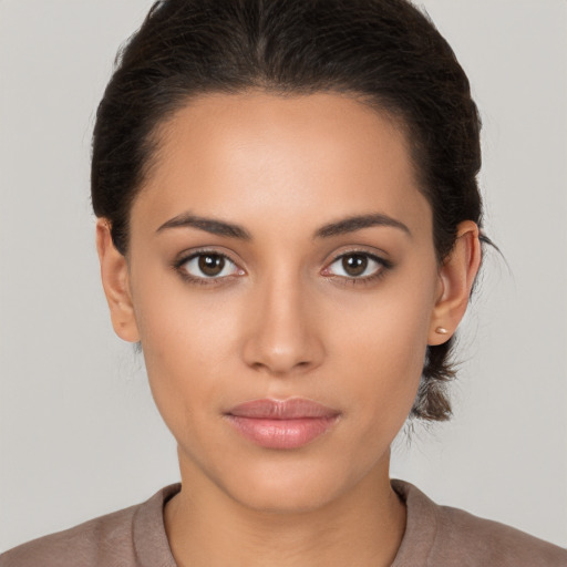 Neutral latino young-adult female with short  brown hair and brown eyes