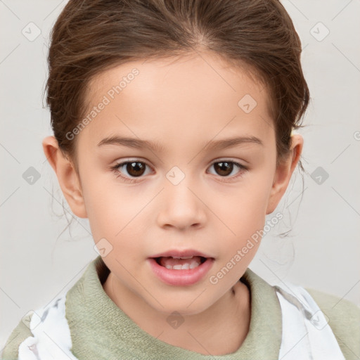 Joyful white child female with short  brown hair and brown eyes