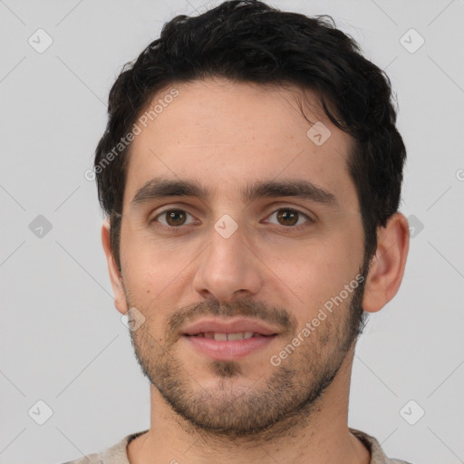 Joyful white young-adult male with short  black hair and brown eyes