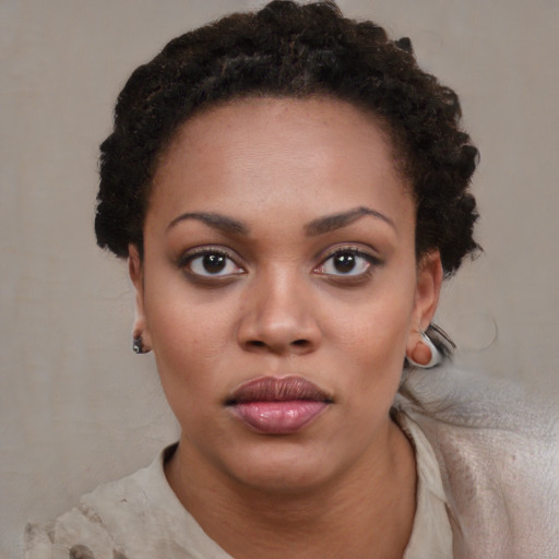 Neutral black young-adult female with short  black hair and brown eyes
