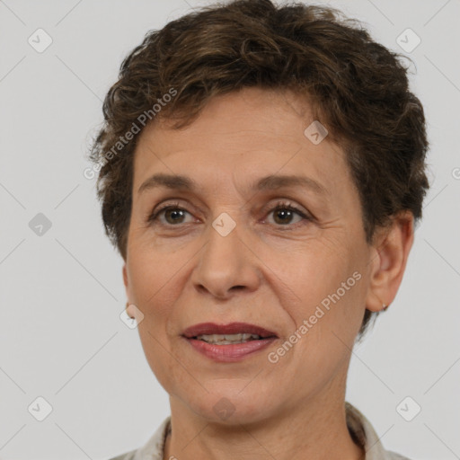 Joyful white adult female with short  brown hair and brown eyes