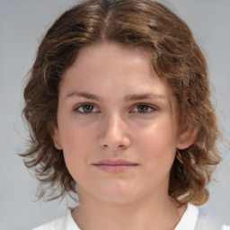 Neutral white child female with medium  brown hair and brown eyes