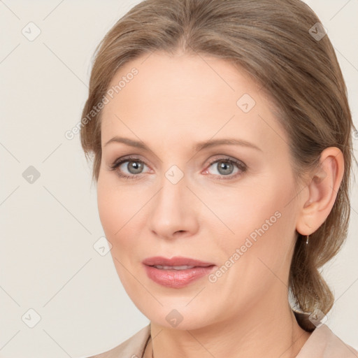 Joyful white young-adult female with medium  brown hair and blue eyes