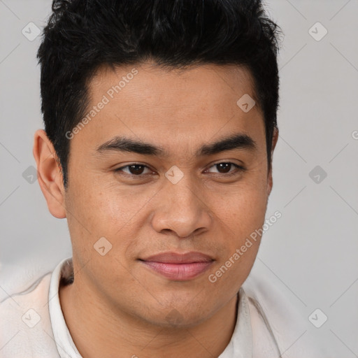 Joyful latino young-adult male with short  brown hair and brown eyes