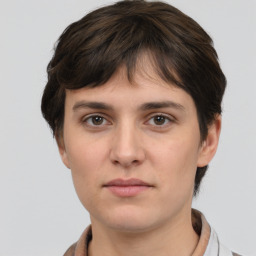 Neutral white young-adult female with short  brown hair and brown eyes