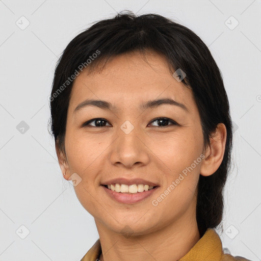 Joyful asian young-adult female with medium  brown hair and brown eyes