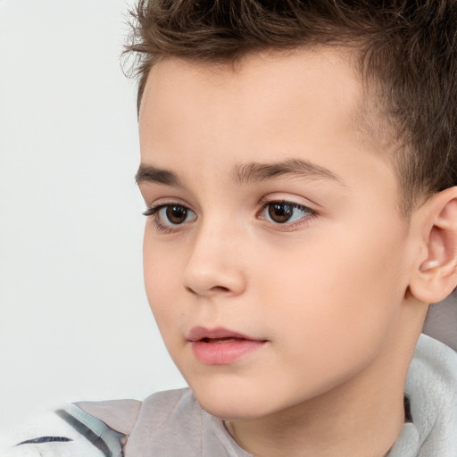 Neutral white child male with short  brown hair and brown eyes