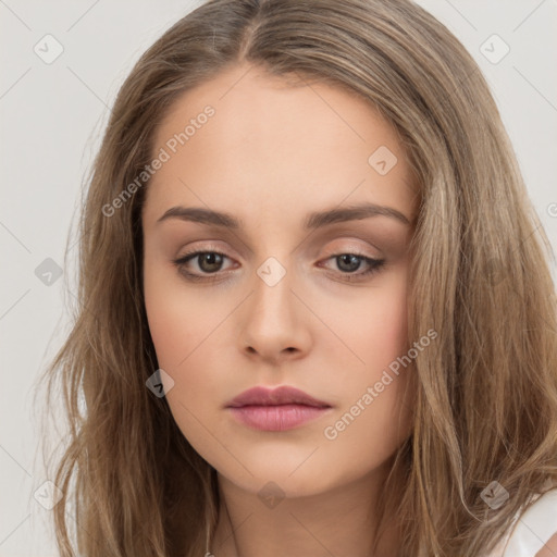 Neutral white young-adult female with long  brown hair and brown eyes