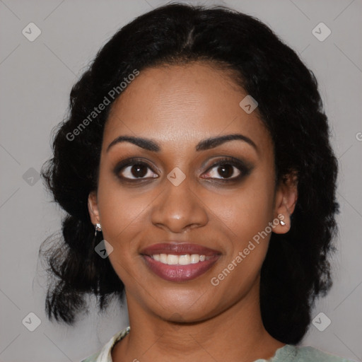 Joyful black young-adult female with medium  black hair and brown eyes