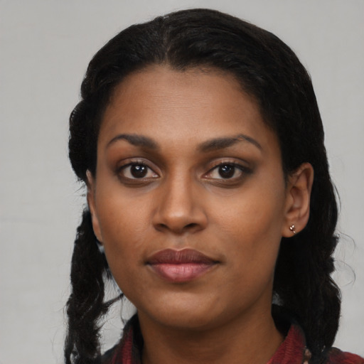 Neutral black young-adult female with long  black hair and brown eyes