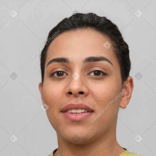 Joyful white young-adult female with short  brown hair and brown eyes