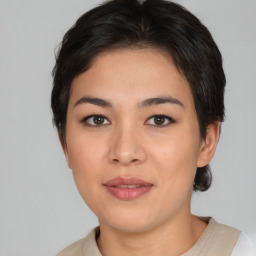 Joyful asian young-adult female with medium  brown hair and brown eyes