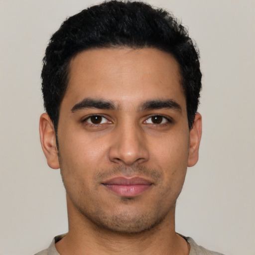 Neutral latino young-adult male with short  black hair and brown eyes