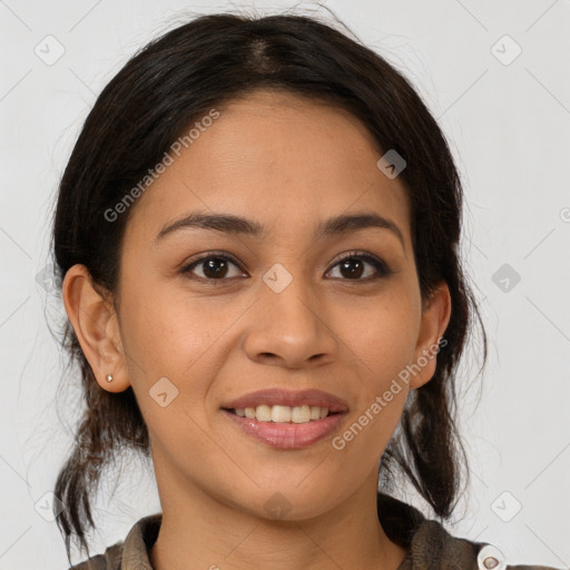 Joyful latino young-adult female with medium  brown hair and brown eyes