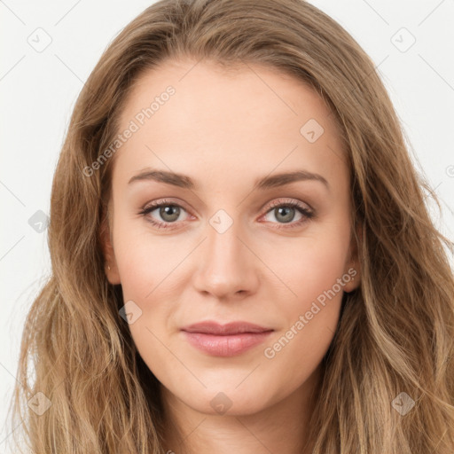 Joyful white young-adult female with long  brown hair and green eyes