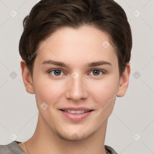 Joyful white young-adult female with short  brown hair and grey eyes