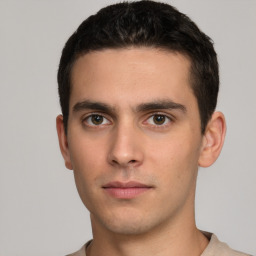 Neutral white young-adult male with short  brown hair and brown eyes