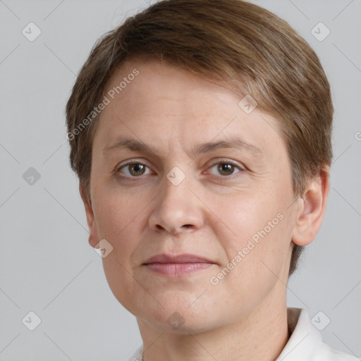 Joyful white adult male with short  brown hair and grey eyes