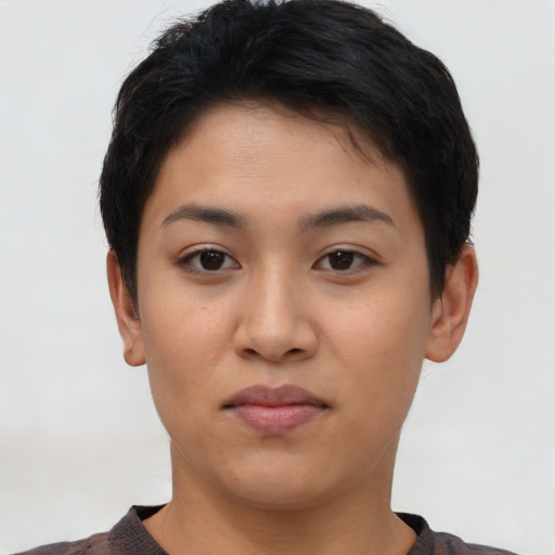 Neutral latino young-adult female with short  black hair and brown eyes