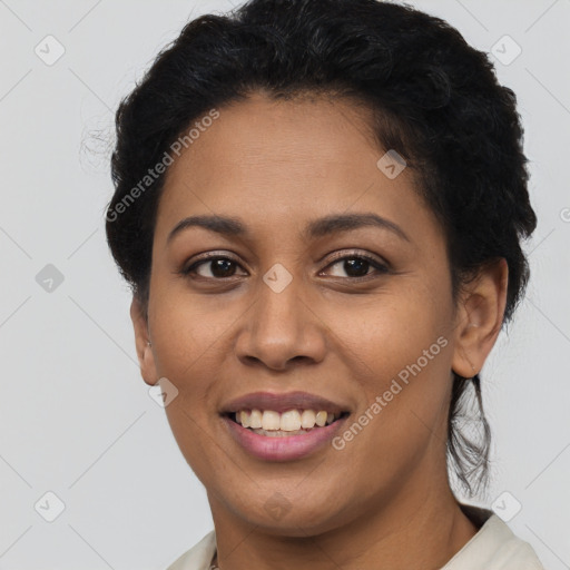 Joyful latino young-adult female with short  brown hair and brown eyes