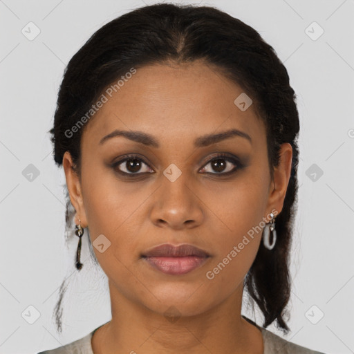 Joyful black young-adult female with medium  brown hair and brown eyes