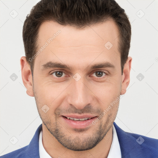 Joyful white young-adult male with short  brown hair and brown eyes