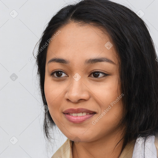 Joyful asian young-adult female with medium  black hair and brown eyes